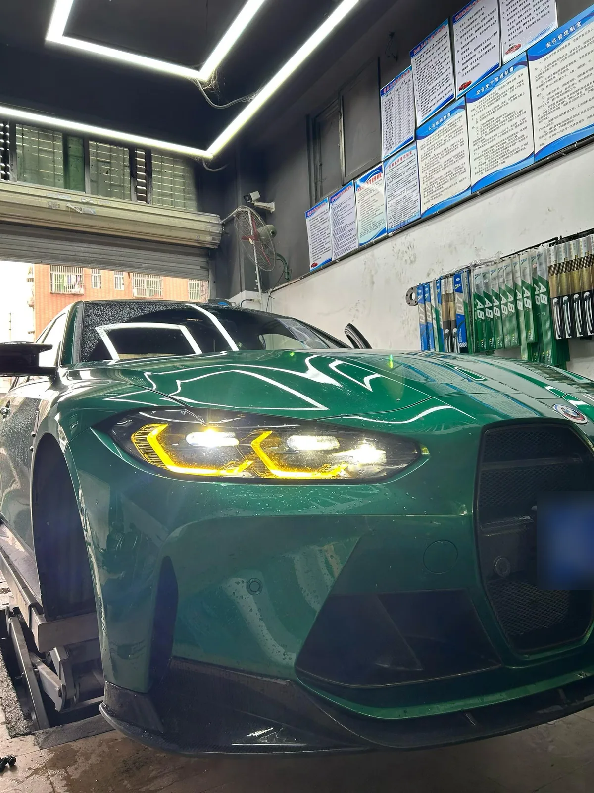 BMW M3 Competition in shop for high-speed brake judder and noise repair