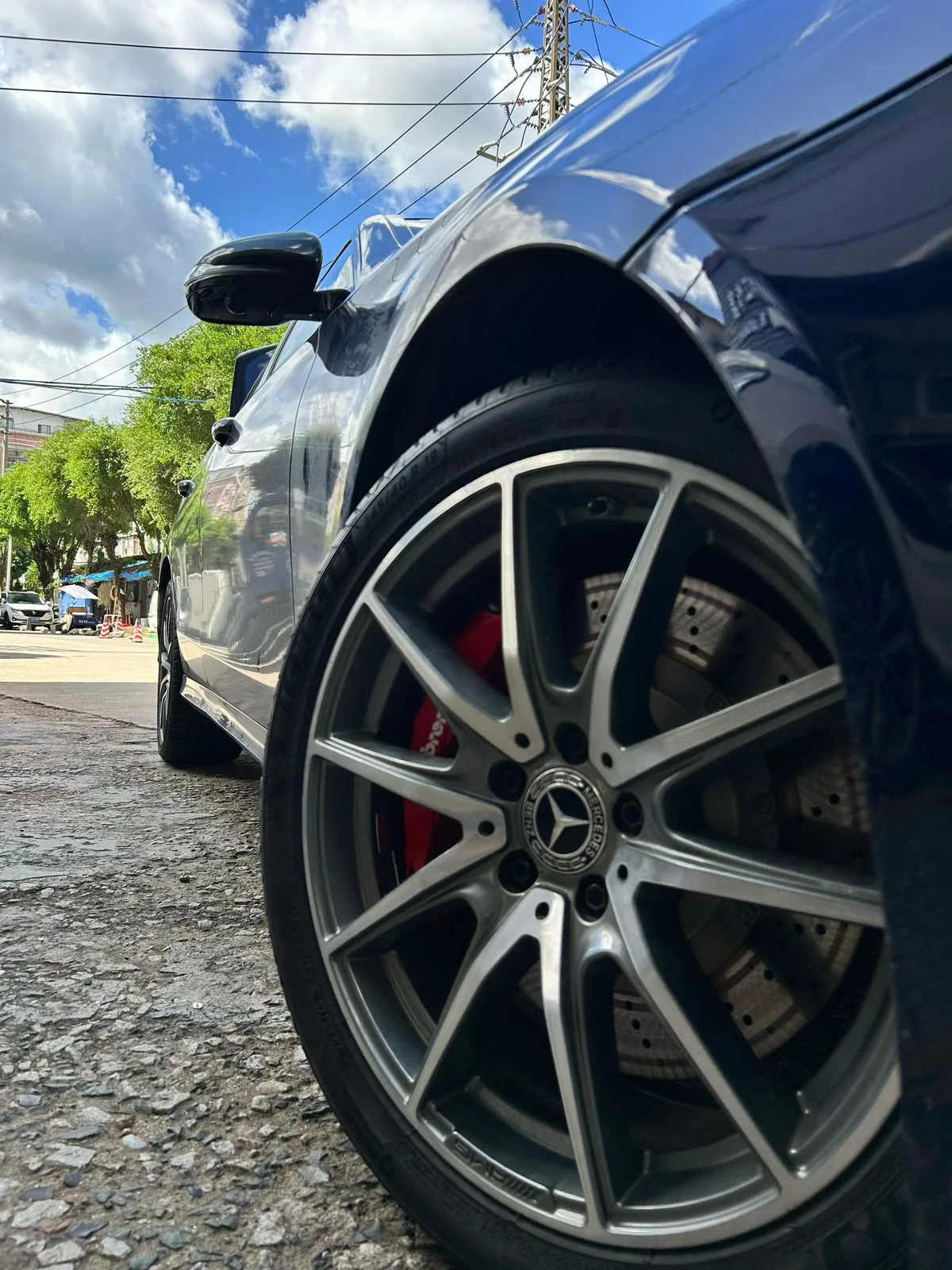 Mercedes-Benz E260 front quarter with big brake upgrade, 245/40 R19 tires