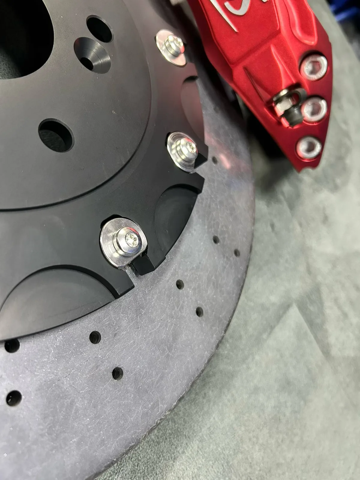 355mm carbon-ceramic brake rotor surface and hardware detail