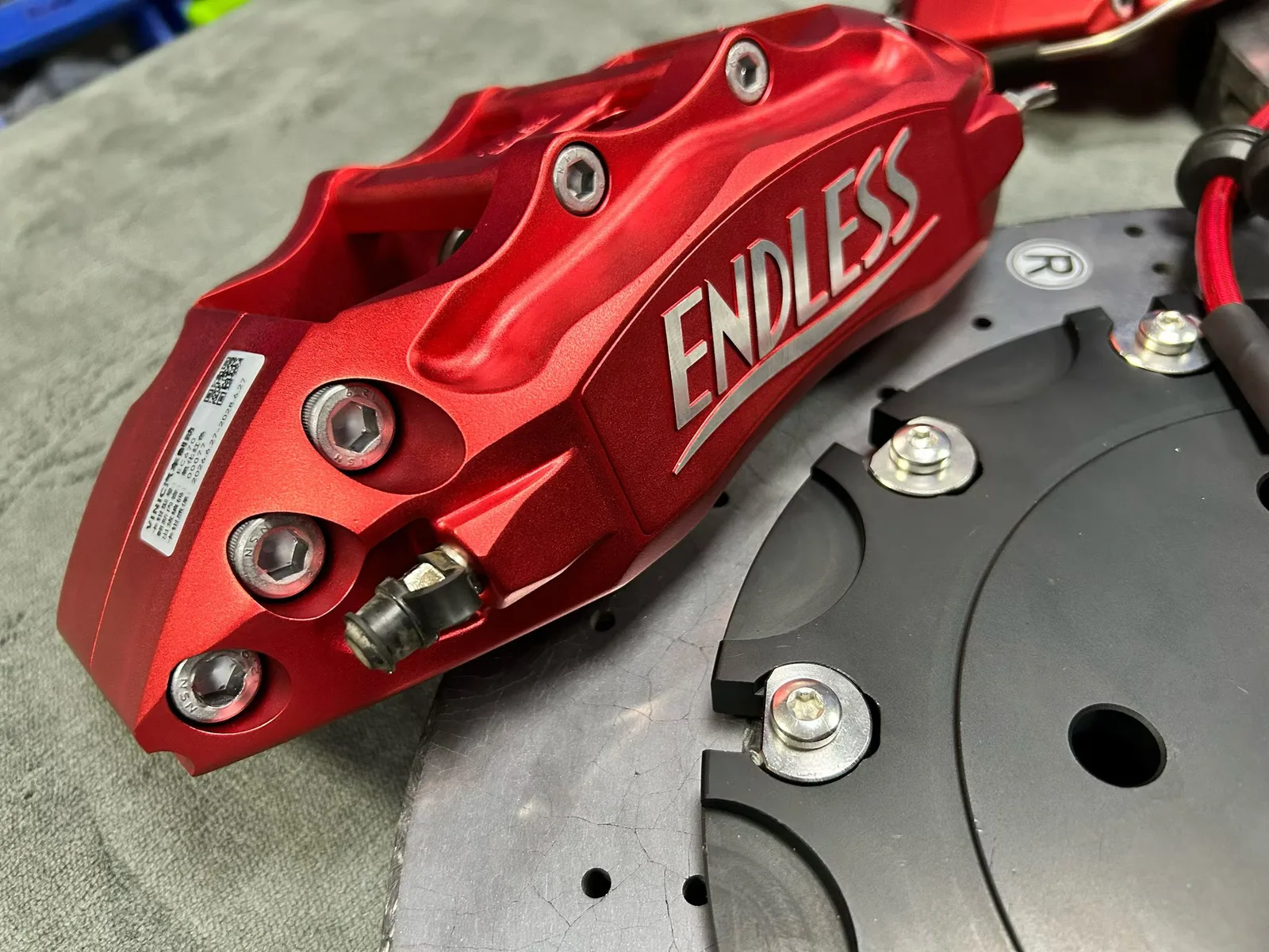 355mm carbon-ceramic rotor paired with red anodized Endless EC670 caliper