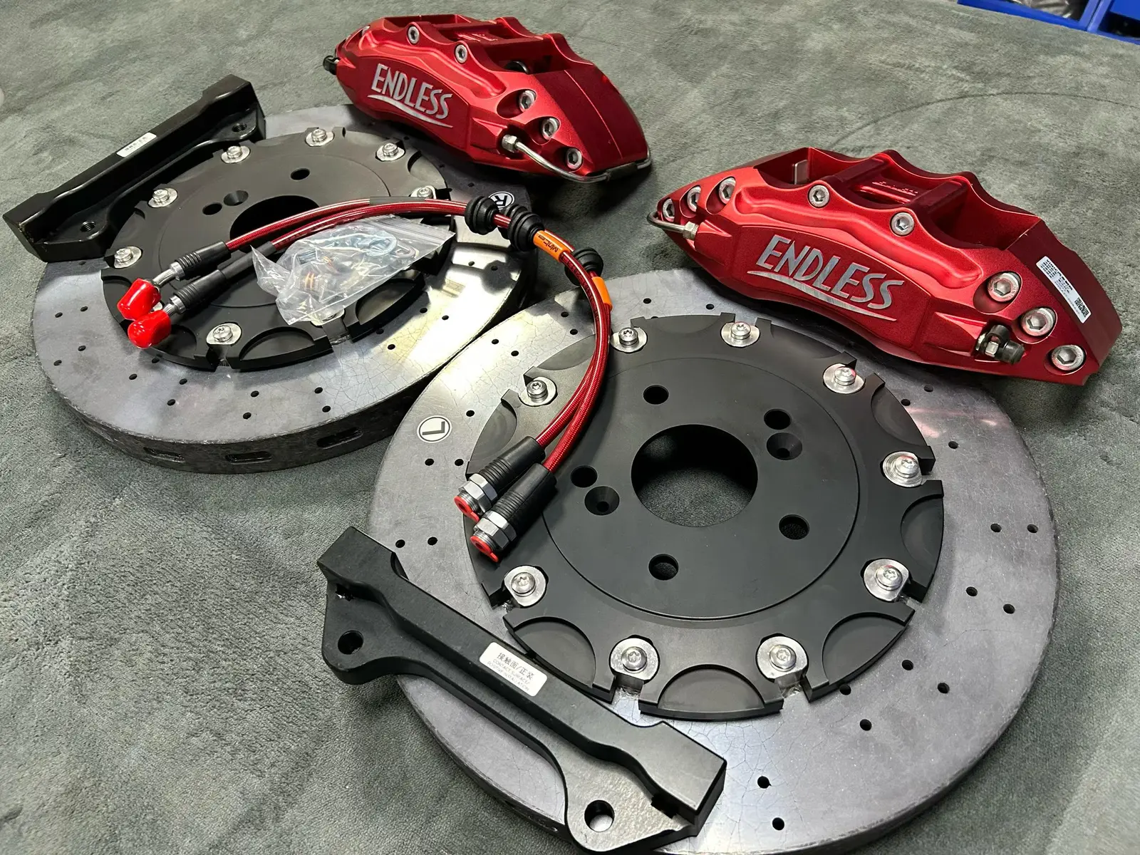 Full 355mm carbon-ceramic brake kit with VINIC stainless brake lines paired with Endless EC670 calipers