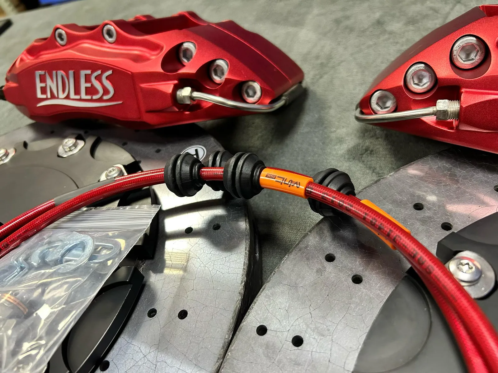 VINIC stainless braided brake lines with carbon-ceramic rotors and Endless EC670 calipers