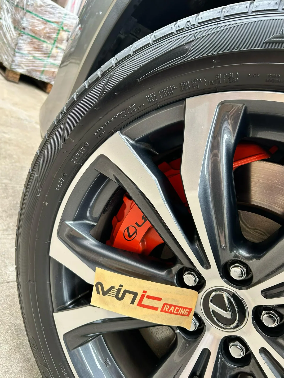 OEM-style red Lexus-logo caliper on Lexus RX450h brake upgrade