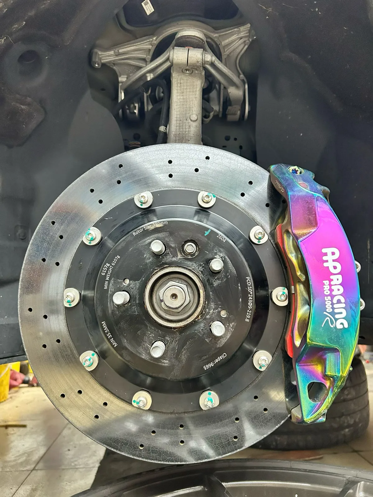 Carbon-ceramic brake rotor installed on Tesla Model 3 Highland