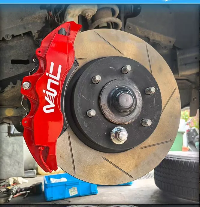 VINIC red 6-piston caliper installed on a Toyota Land Cruiser hub
